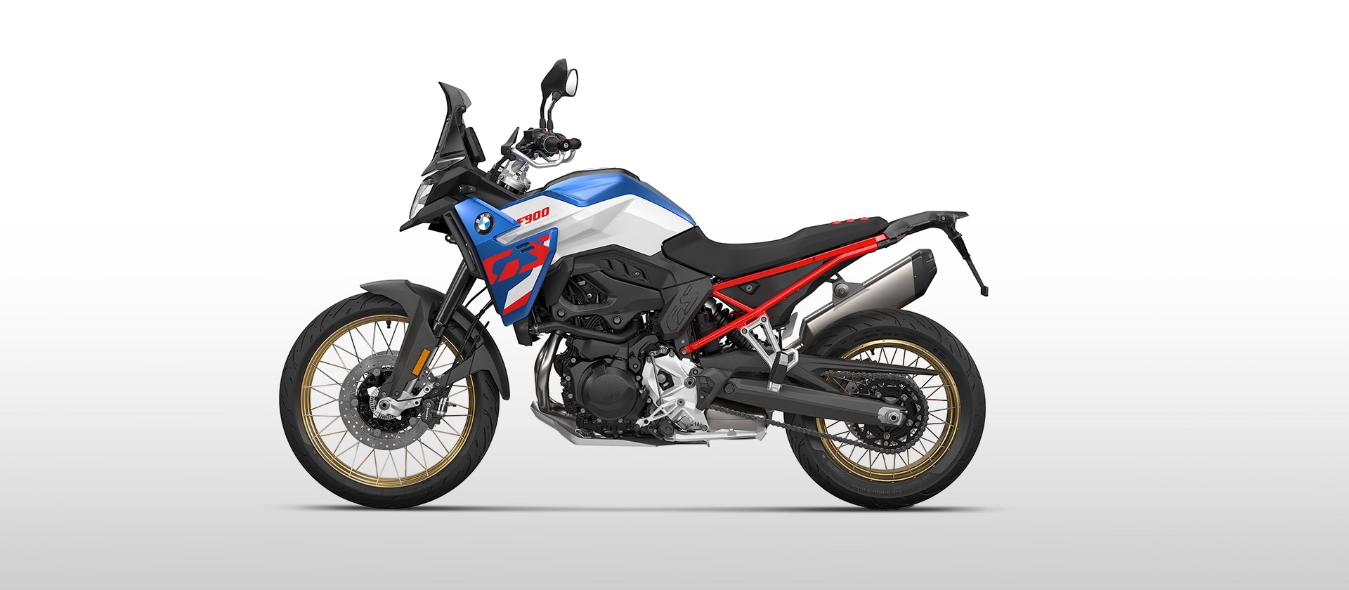 Modelul F 900 GS de la BMW Motorrad în alb Light uni/albastru Racing metalizat/roșu Racing